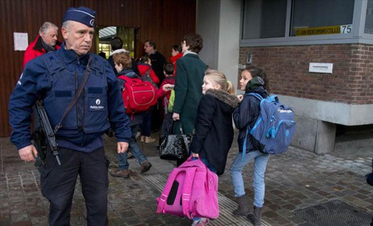 Brussels schools reopen as terror alert stays at highest level